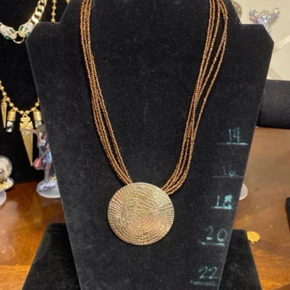 Goldbronze beaded necklace with Medallion Pendant